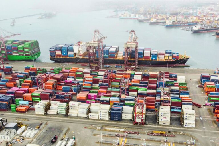 a shipping port with container and ships related to India US trade on which trump tariff refunds will be given back