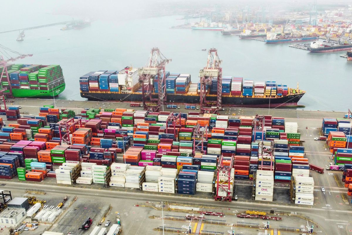 a shipping port with container and ships related to India US trade on which trump tariff refunds will be given back